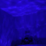 Abajur Projetor de Ondas com Caixa de Som Embutida