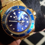 Rolex Submariner Dourado (Fundo Azul) - Sunshine View Store